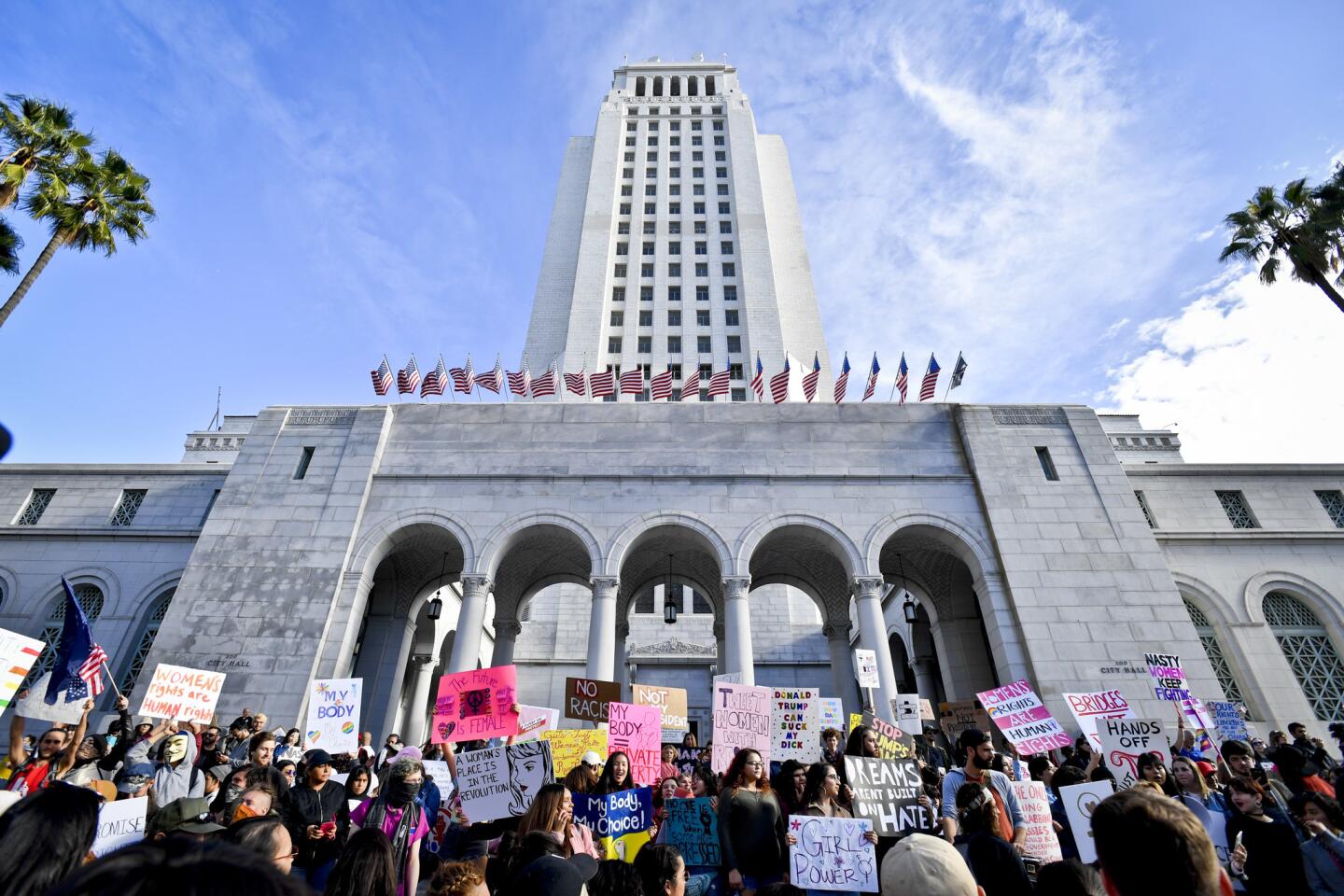 Shaded pink, women's protest fills the streets of downtown L.A.